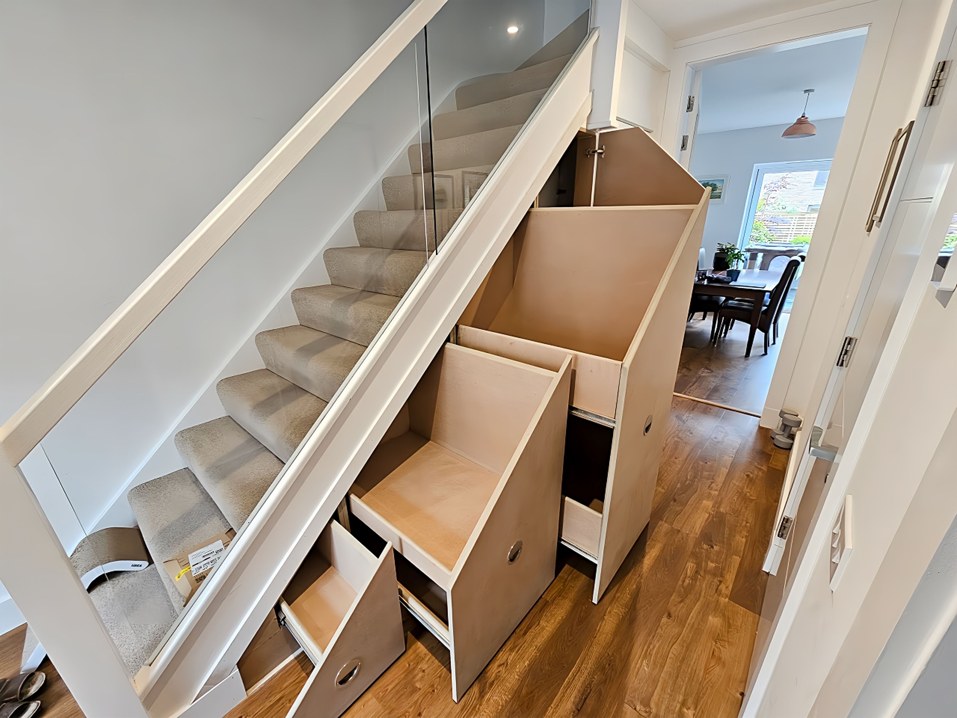 Contemporary space saving stair storage solutions