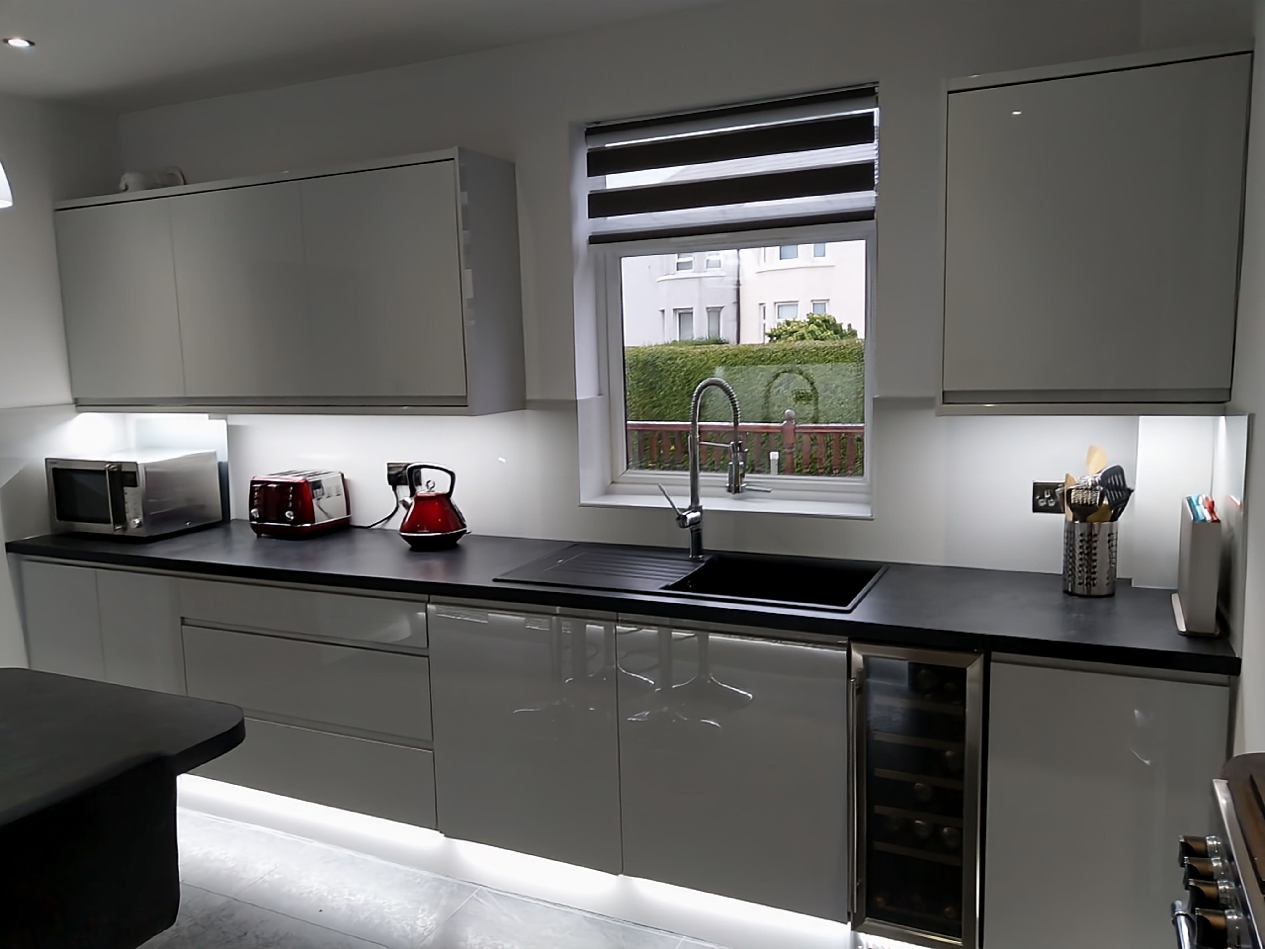 Open plan kitchen island build with breakfast bar seating configuration