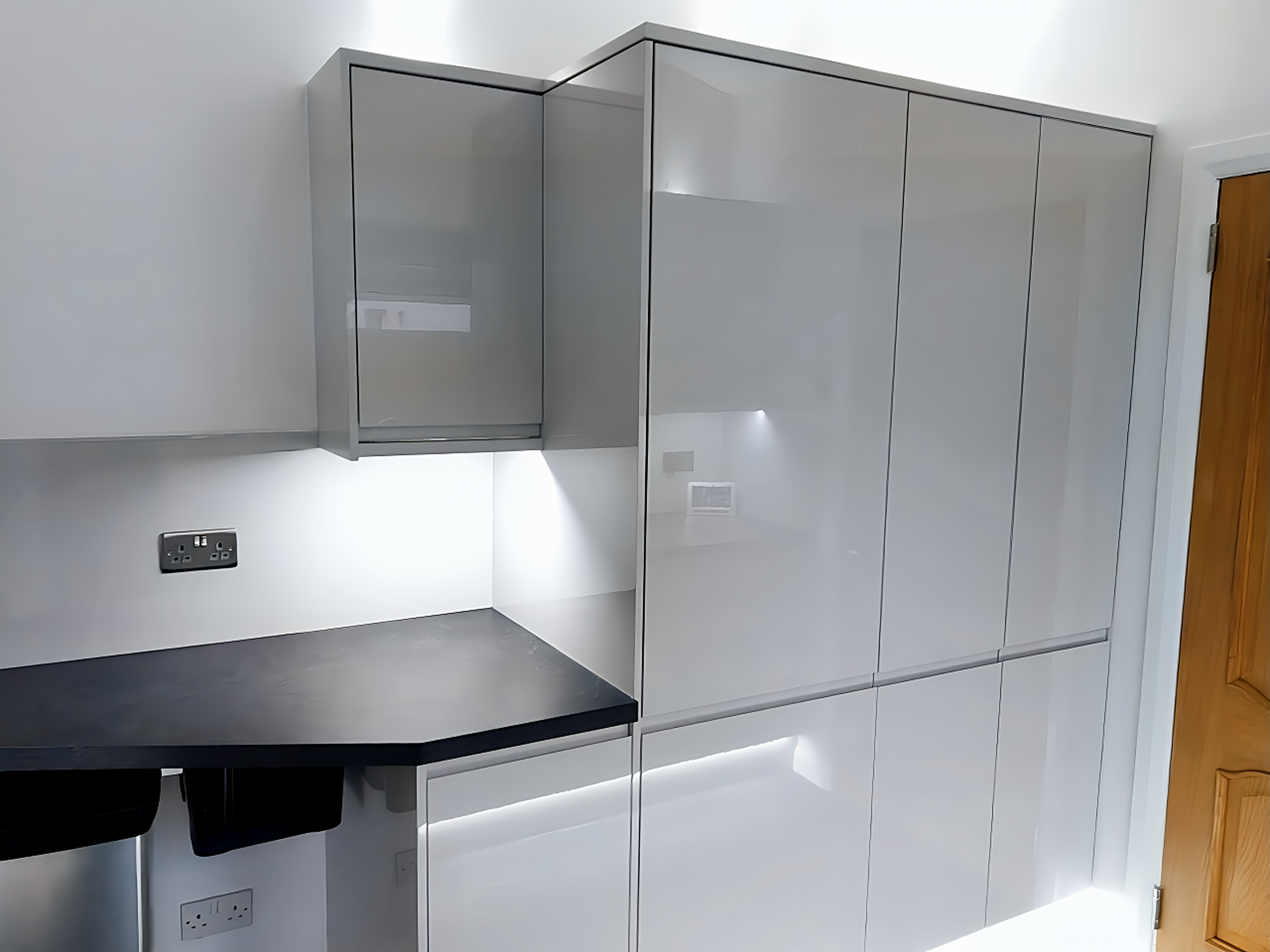 Completed uniform utility room cabinet extensions