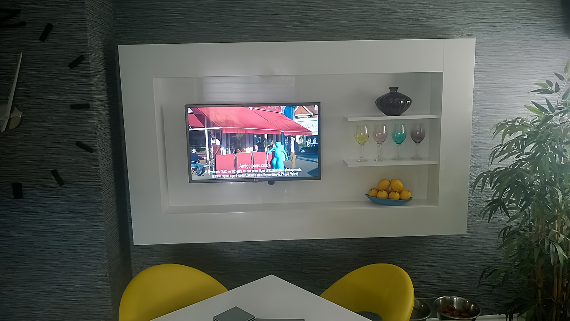 Modern gloss media wall with integrated shelving